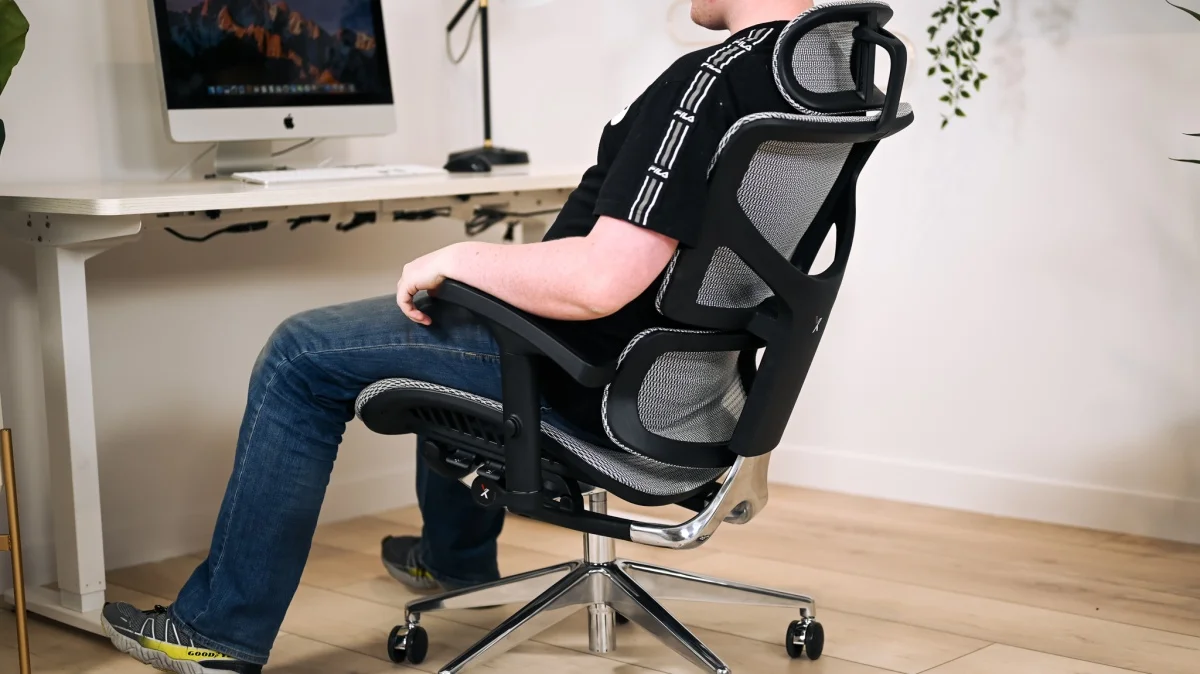 The Nebula Mesh ergonomic office chair in a clean, modern workspace.